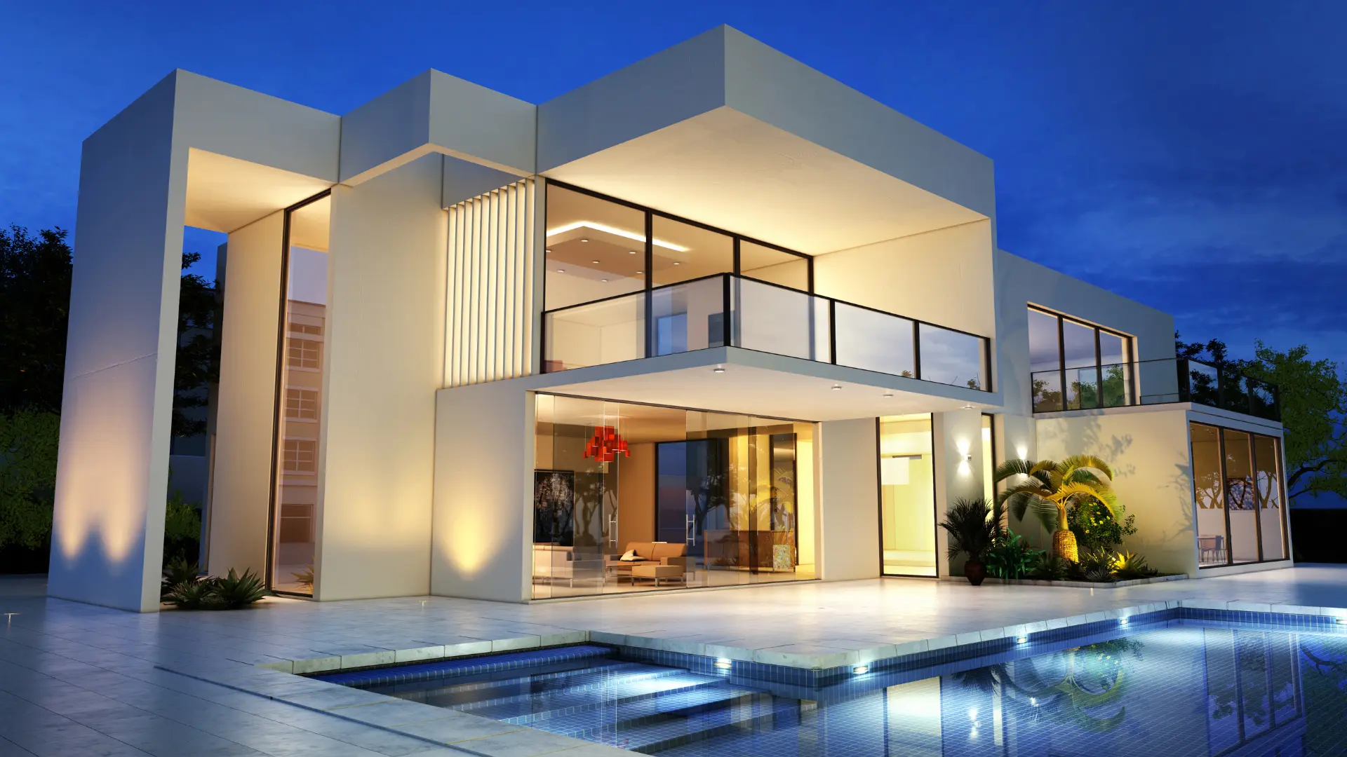 Chalet moderno con piscina al anochecer, del tipo que comercializamos en l'Horta Sud (Valencia)